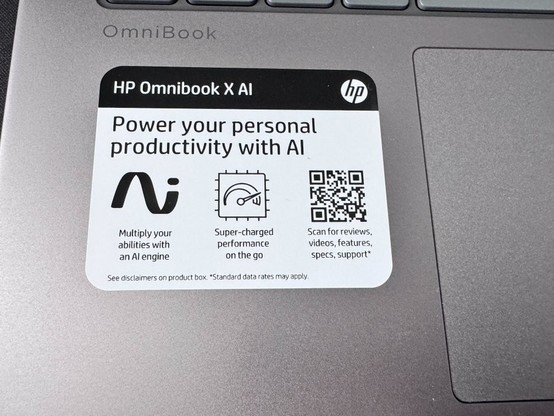AI stickers have arrived (apparently) to ruin your day. Shown applied to another laptop brand.