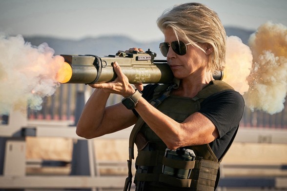 A still of then-61 year-old Linda Hamilton holding a rocket launcher playing the part of Sarah Connor, in 2019's Terminator: Dark Fate.